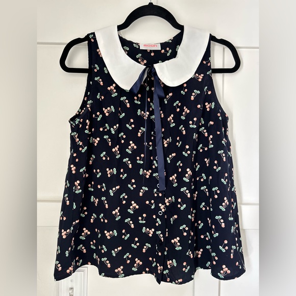 Modcloth Tops - Navy sleeveless shirt blouse. Peter Pan collar, bows & cherry design. Size M